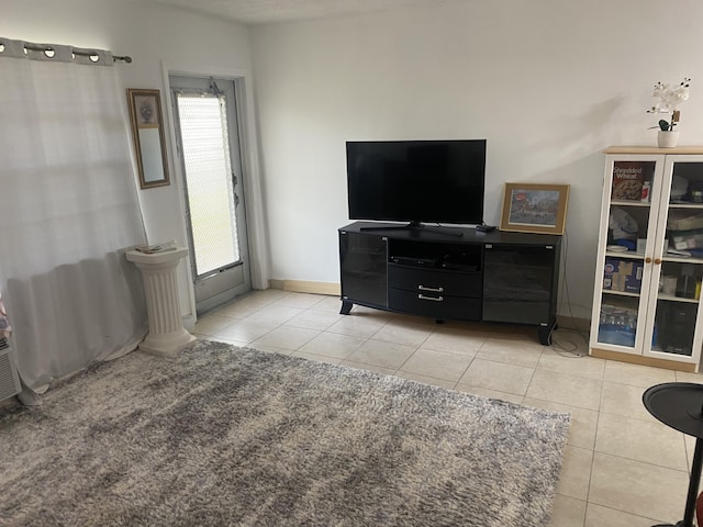 living room featuring light tile patterned flooring