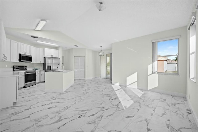 kitchen with sink, white cabinetry, a kitchen island with sink, and appliances with stainless steel finishes