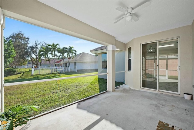 view of patio featuring ceiling fan