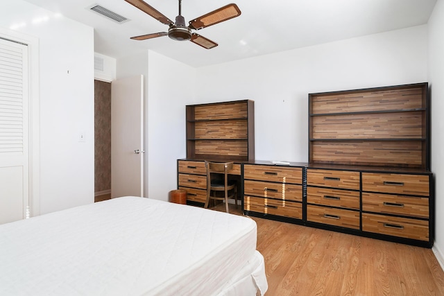 bedroom featuring light hardwood / wood-style flooring and ceiling fan