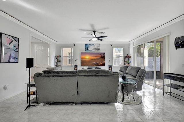 living room featuring ceiling fan and ornamental molding