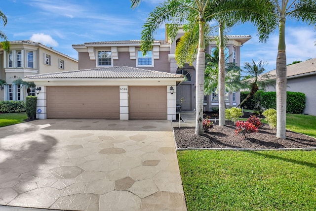 mediterranean / spanish-style house featuring a garage