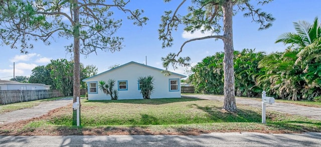 view of home's exterior featuring a yard