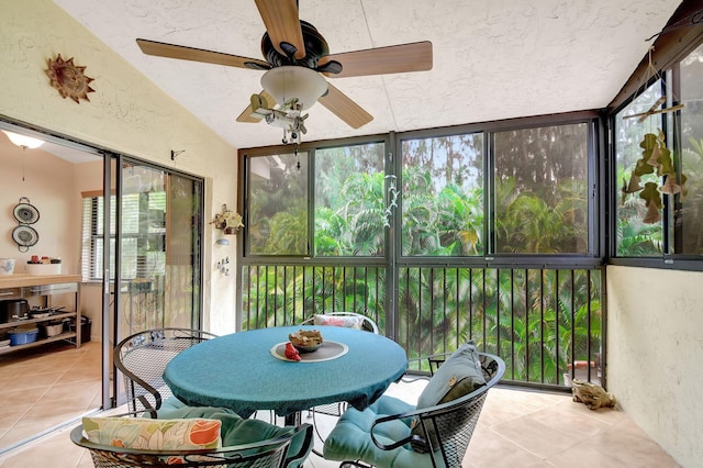 sunroom featuring ceiling fan