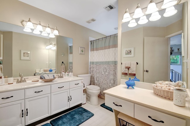 full bathroom with visible vents, a sink, and double vanity