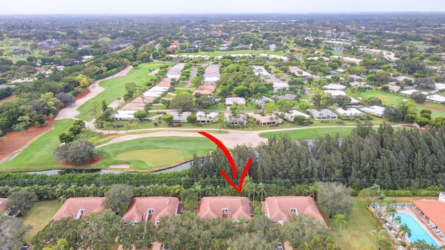 birds eye view of property with a residential view and golf course view