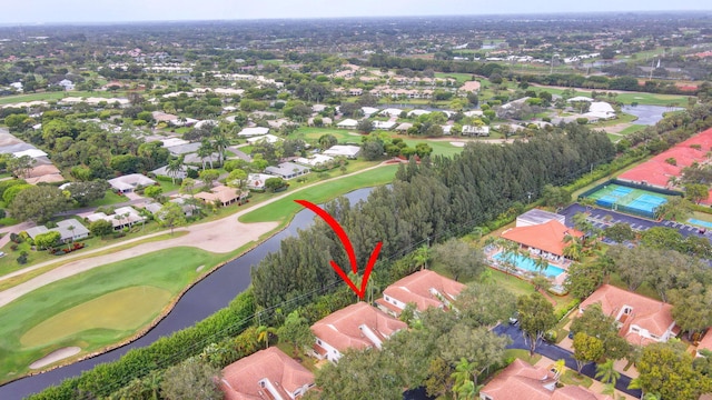 aerial view with a water view, a residential view, and golf course view