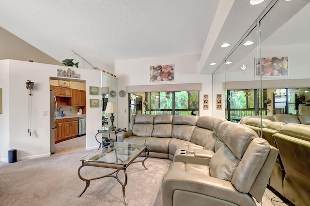 living room with light carpet, baseboards, lofted ceiling, a textured ceiling, and recessed lighting