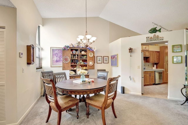 dining room featuring light carpet, baseboards, lofted ceiling, and an inviting chandelier