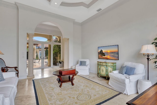 living room featuring beamed ceiling, crown molding, a high ceiling, and french doors