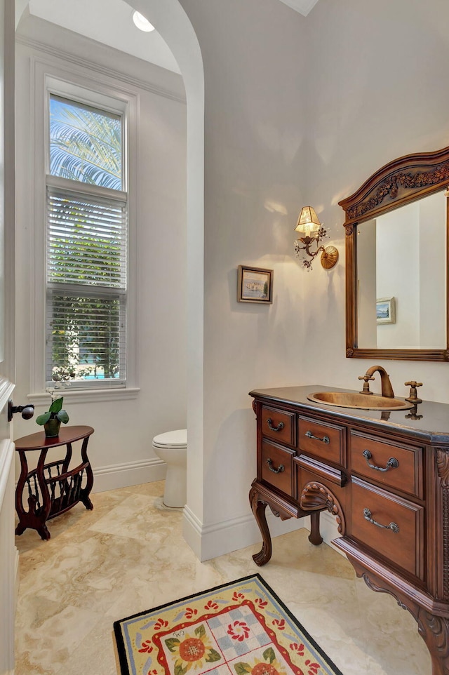 bathroom with vanity and toilet