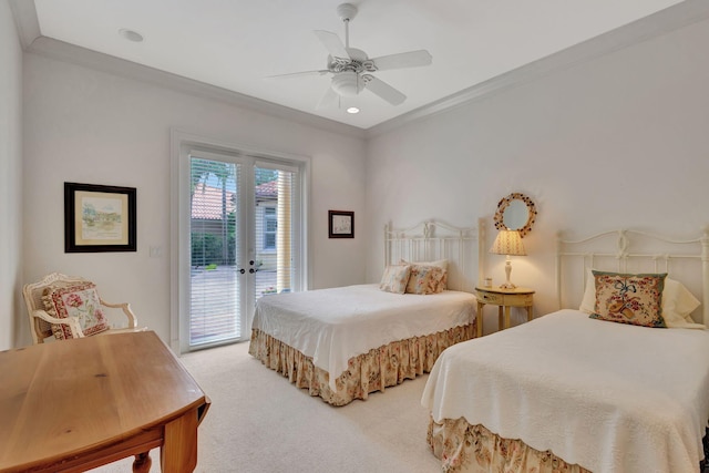 carpeted bedroom with access to exterior, ceiling fan, crown molding, and french doors