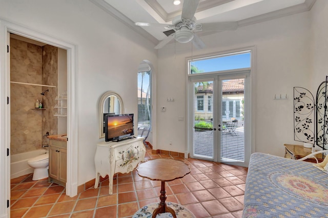 tiled living room featuring crown molding, french doors, and ceiling fan