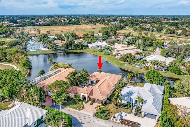 bird's eye view with a water view