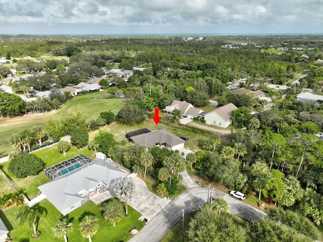 bird's eye view with a forest view