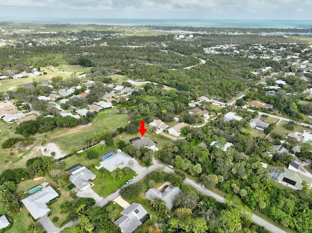 bird's eye view featuring a residential view and a water view