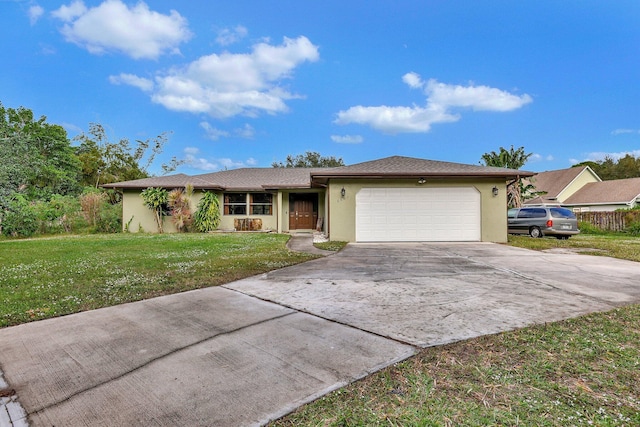 ranch-style house with a front yard, an attached garage, concrete driveway, and stucco siding