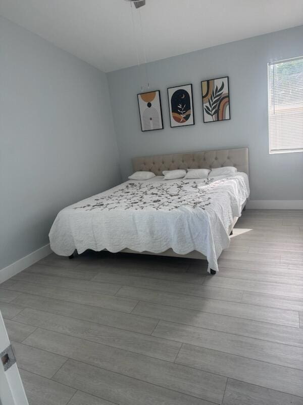 bedroom featuring light hardwood / wood-style floors