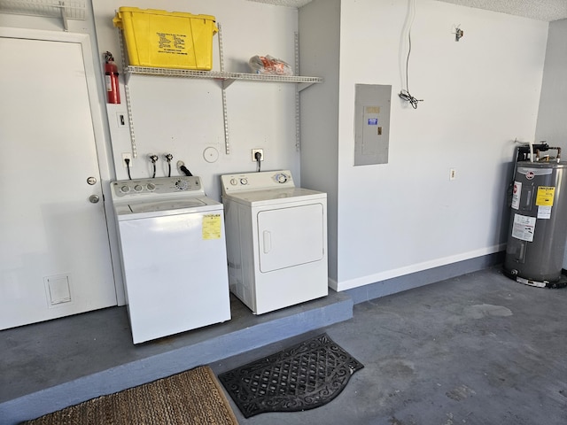 laundry area with electric panel, washer and clothes dryer, and water heater