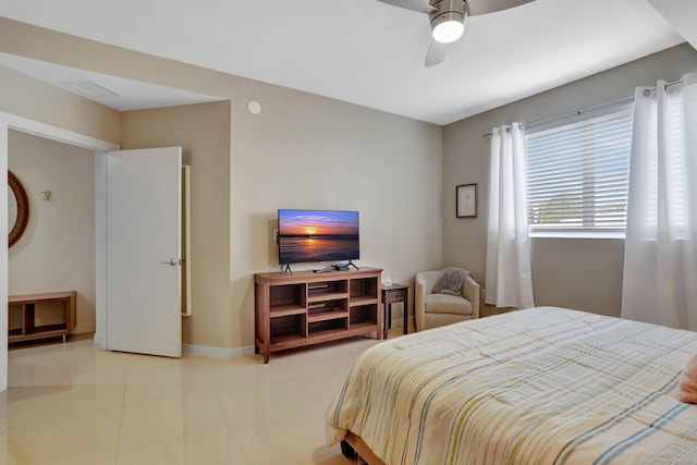 bedroom featuring ceiling fan and light tile patterned floors