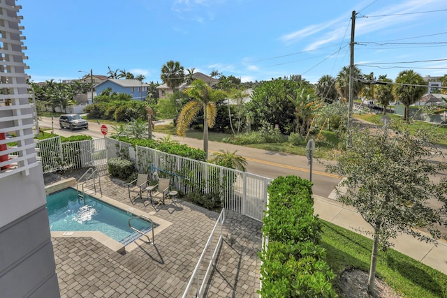 view of swimming pool with a patio