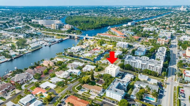 birds eye view of property featuring a water view