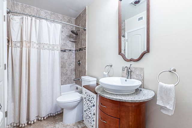 full bathroom featuring vanity, toilet, and shower / bath combo