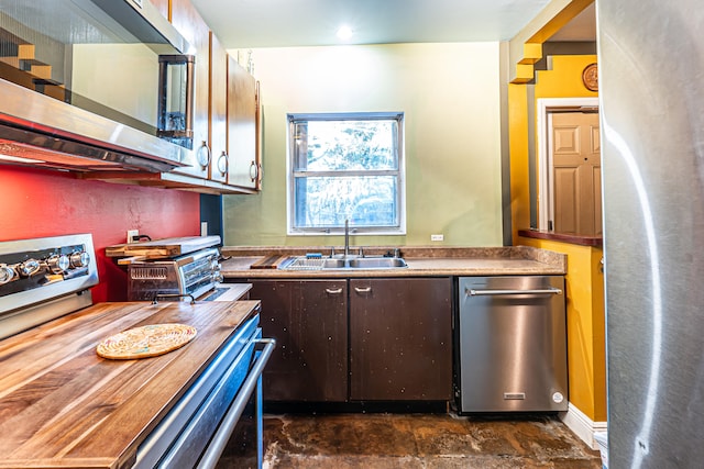 kitchen featuring appliances with stainless steel finishes and sink