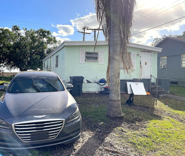 view of property exterior with central air condition unit