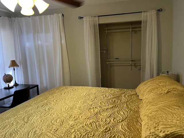 bedroom featuring a closet and ceiling fan