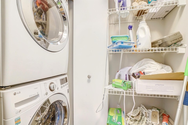 washroom with stacked washer / dryer