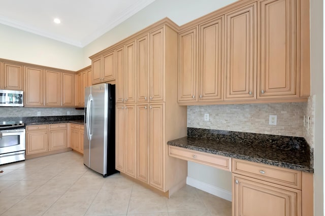 kitchen featuring crown molding, dark stone countertops, light tile patterned floors, appliances with stainless steel finishes, and tasteful backsplash