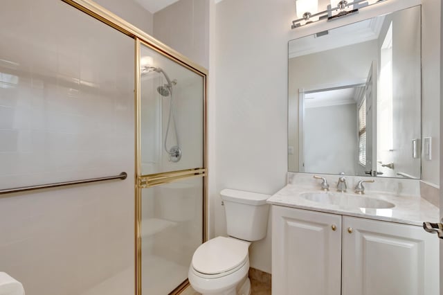 bathroom featuring vanity, toilet, an enclosed shower, and ornamental molding