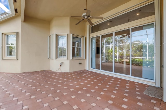 view of patio featuring ceiling fan