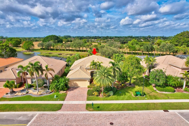 birds eye view of property featuring a water view