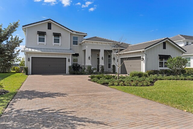 view of front facade with a front lawn