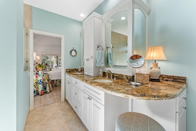 bathroom with hardwood / wood-style flooring and vanity