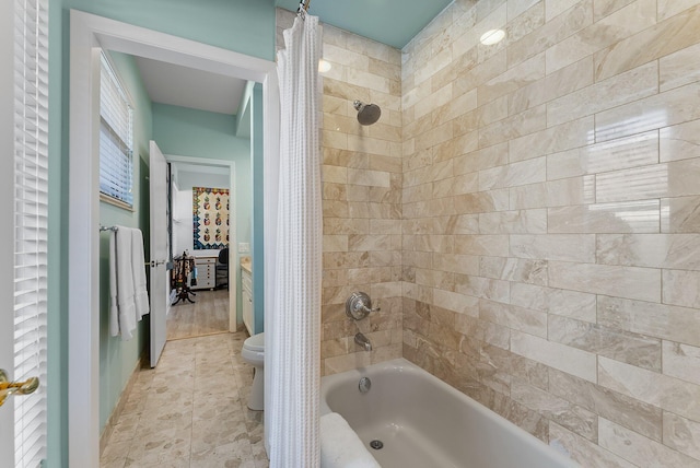 bathroom featuring toilet and shower / bathtub combination with curtain