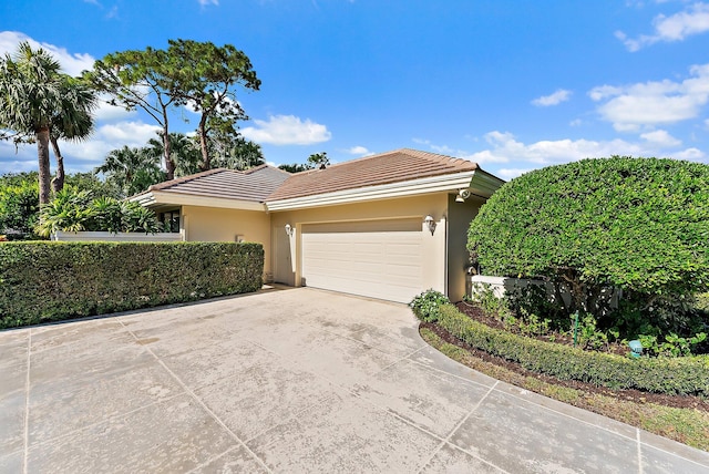 exterior space with a garage