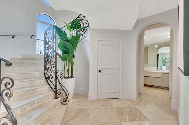 stairs featuring sink