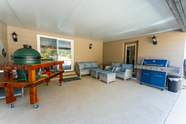 exterior space featuring an outdoor hangout area and a grill