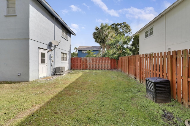 view of yard with central AC unit