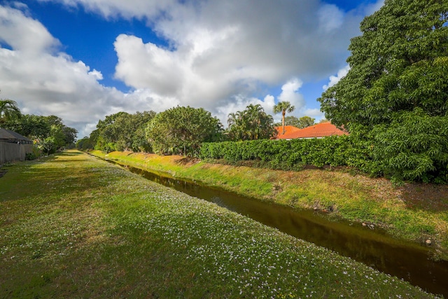 view of yard with a water view