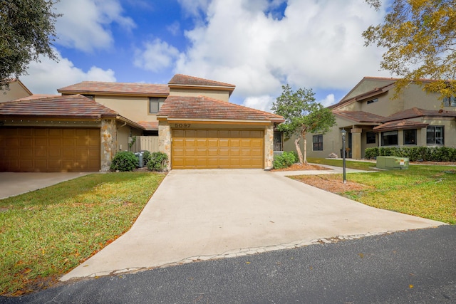 view of front of property with a garage, a front lawn, and central air condition unit