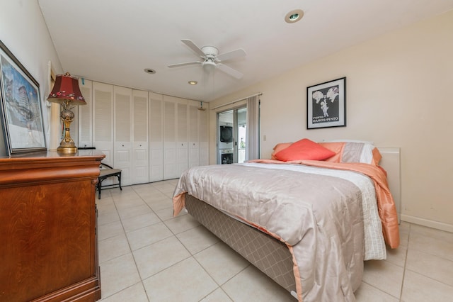 bedroom with a closet, ceiling fan, and light tile patterned flooring