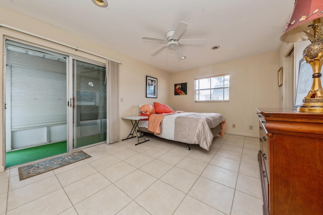 tiled bedroom featuring access to exterior and ceiling fan