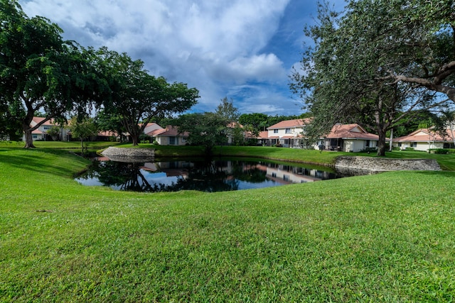 view of yard with a water view