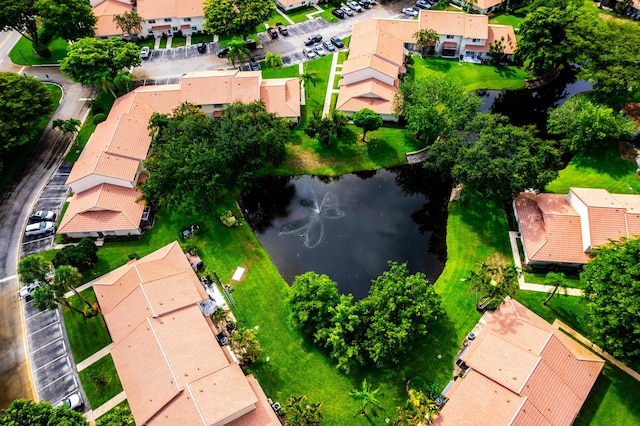 drone / aerial view featuring a water view