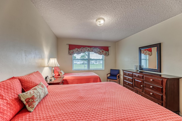 bedroom featuring a textured ceiling