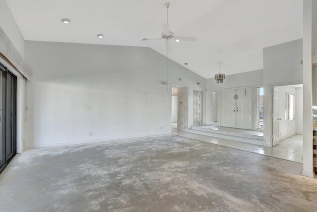 unfurnished living room with ceiling fan and high vaulted ceiling